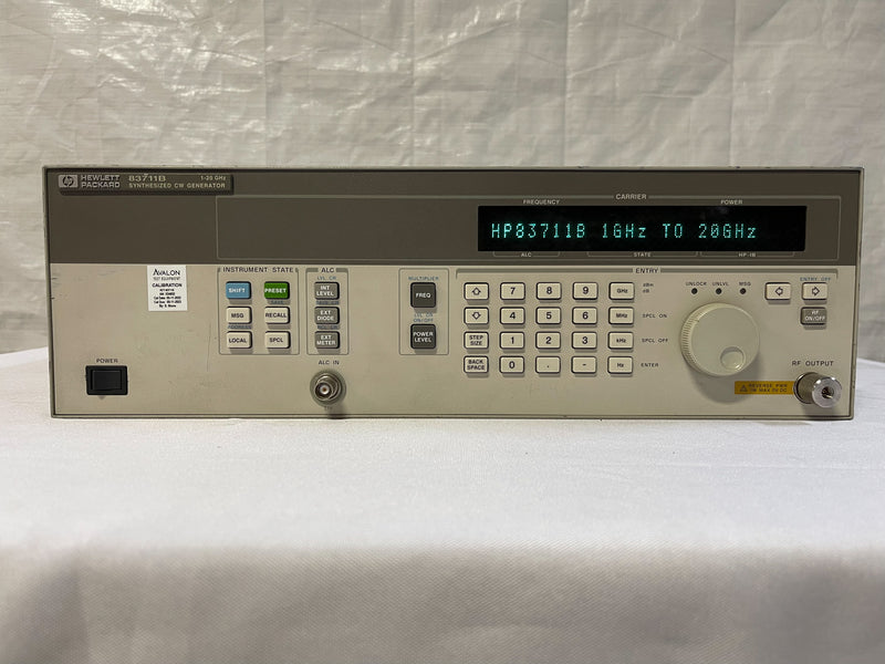 HP / Agilent 83711 B Synthesized CW Generator